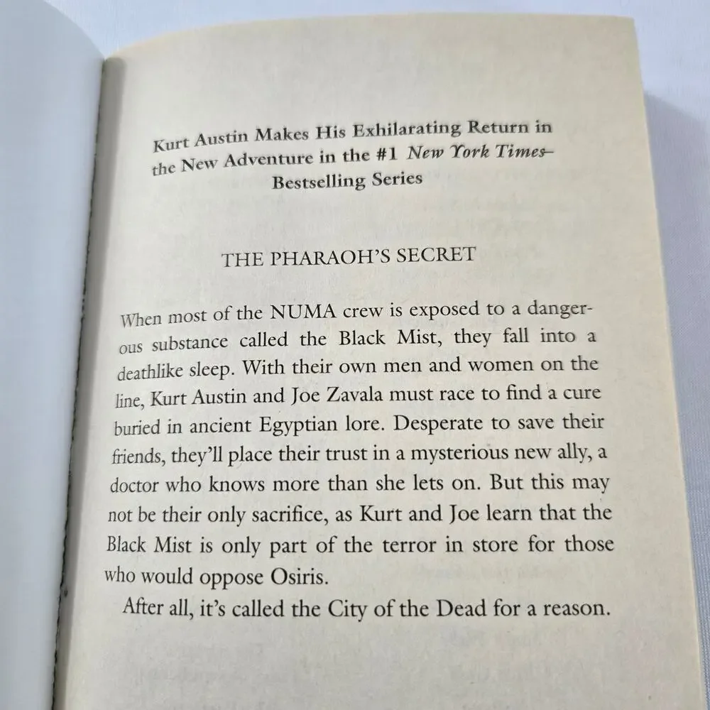 Clive Cussler Paperback Books - The Tombs and The Pharaoh's Secret